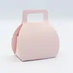 حقيبة كرتونية باللون الوردي
